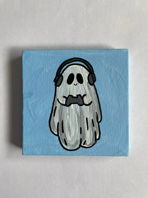 "3\"x3\" Hand Painted Gamer Ghost Canvas Painting This small ghost painting is the perfect addition to your decor.  Hand painted on a 3\"x3\" canvas with acrylic paint, each painting is one of a kind. These paintings are made to order and may vary slightly.  A great gift for a friend or family member or perfect just for you!" Video Game Painting Canvas, Canvas Art Painting Acrylic Ideas, Gamer Painting Ideas, Ghost Halloween Painting, Gaming Painting Ideas, Video Game Painting Ideas, Painting Ideas On Canvas Ghost, Easy Cute Painting Ideas On Canvas, Cool Stuff To Paint