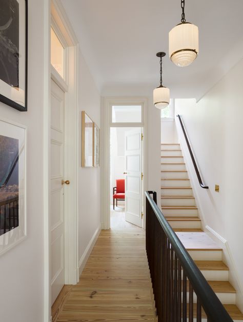 Tribeca Townhouse by YUN Architecture Window Above Door, Best Door Designs, Door Design Ideas, Street Townhouse, Townhouse Interior, Stairway Design, Vintage Light Fixtures, Interior Windows, Transom Windows