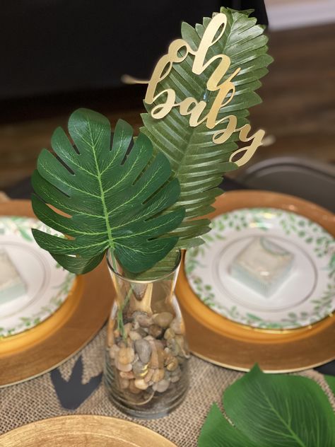 Jungle Dinosaur Party, Dino Themed Centerpieces, Dino Table Centerpiece, Wild Baby Shower Theme Boy, Jungle Safari Centerpieces Ideas, Gold And Green Baby Shower Ideas, Table Centerpieces For Baby Shower Boys, Safari Theme Centerpieces Diy, Jungle Baby Shower Theme Centerpieces