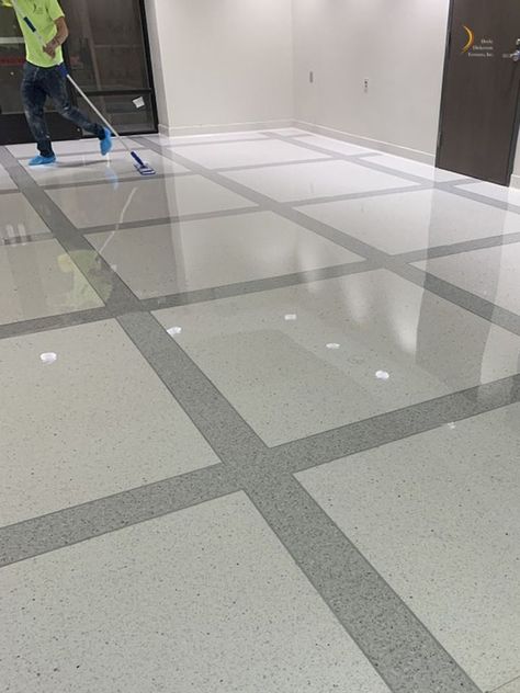 Installation of new terrazzo flooring for a Naval Office. Doyle Dickerson Terrazzo installer applying multiple coats of sealer, which protects the terrazzo floor from stains. #terrazzo #flooring #commercialflooring Marble Tiles Floor, Terrazzo Floor Design, Parking Tiles Design, Terrazo Flooring, Stairs Tiles Design, Room Tiles Design, Floor Pattern Design, Modern Terrazzo, Rooftop Patio Design