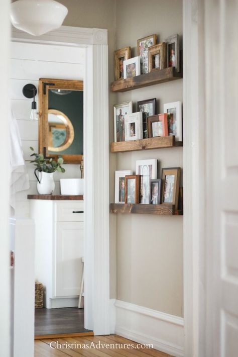 Easy DIY picture ledge - a great way to decorate a narrow hallway. This is a flexible alternative to a gallery wall! Decorate A Narrow Hallway, Diy Ledge Shelf, Decorating A Narrow Hallway, Diy Picture Ledge, Diy Home Decor For Apartments, Decor Ikea, Picture Ledge, Narrow Hallway, Diy Picture