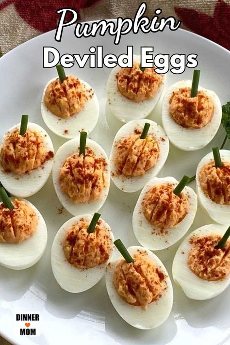 Wow your guests with these pumpkin-shaped deviled eggs! Despite the name, there's no pumpkin in this recipe, but the protein boost and festive shape makes them the perfect appetizer to have on hand for your Fall gatherings. This low-carb delicacy is not only a visual treat but also incredibly delicious and satisfying. Serve them up as a creative and healthy appetizer that will have everyone talking and coming back for seconds! Get all the tips to make Pumpkin Deviled Eggs at Dinner-Mom.com. Fall Party Snacks, Pumpkin Deviled Eggs, Healthy Deviled Eggs, Fall Party Food, Eggs Dinner, Fall Parties, Deviled Eggs Easy, Healthy Appetizer, Pumpkin Uses