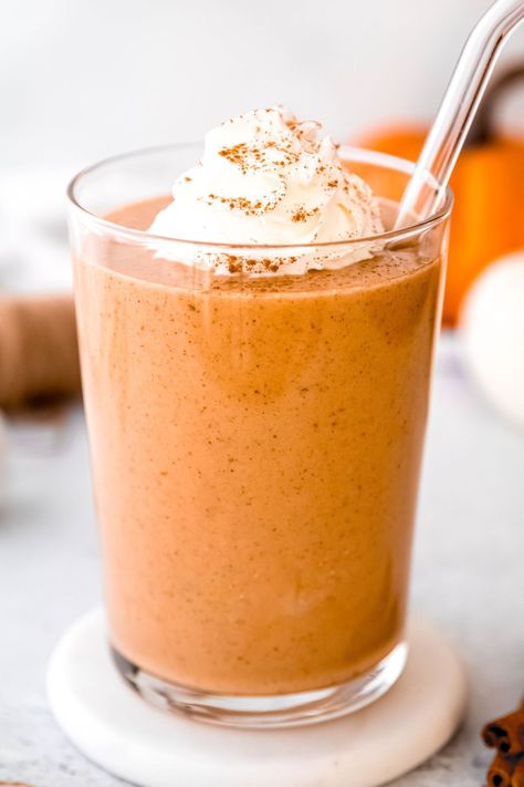 Indulge in the flavors of fall with this Pumpkin Protein Shake! Packed with 35g of protein, this shake is a perfect post-workout treat or breakfast option. Featuring pumpkin puree with a hint of pumpkin spice, banana, & protein powder, it's creamy & delicious. Enjoy the cozy, autumnal goodness of a pumpkin pie in a glass, while keeping your health goals on track. Sip your way to a healthier, tastier day with this easy-to-make pumpkin protein smoothie! Vegan instructions included. Pumpkin Cheesecake Protein Shake, Pumpkin Protein Smoothie, Pumpkin Pie Protein Shake, Pumpkin Protein Shake, Pumpkin Shake, Health Shakes, Premier Protein Shakes, Protein Powder Shakes, Pumpkin Protein