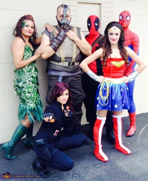 Marisol: Poison Ivy, Bane, Spiderman, Deadpool, Wonder Woman and Black Widow. Poison Ivy's costume was a made by adding dollar store leaves on a black dress. Bane's vest was made with... Hero Vs Villain, Villain Party, Heroes Vs Villains, 30th Ideas, Villain Dresses, Villains Party, Dress Up Ideas, Halloween Group, Poison Ivy Costumes