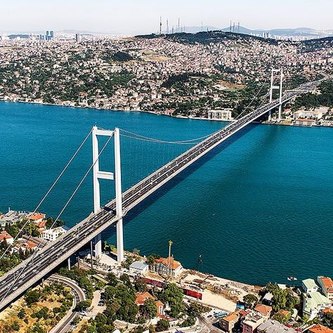 Happy Friday y'all! And here is a fun fact about Stambol Studios! 🤗 .  This picture is the Bosphorus Bridge, connecting the Europe and Asia. Stambol is rooted in the idea of merging art and engineering. Named for Istanbul, where East meets West, we exist at the intersection of a coder’s obsessive left-brain approach and an artist’s expressive right-brain style. 😏 .  Creative and analytical are equals at Stambol. One is not more important, nor is it more respected than the other. We keep an eye Bosphorus Bridge, City Of Dreams, Turkey Photos, Istanbul Travel, Hagia Sophia, Turkey Travel, Rome Travel, A Bridge, Europe Travel Tips