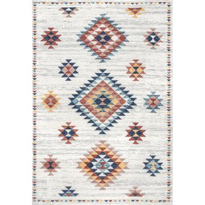 Add a pop of southwestern flair to your space with this rustic color palette and vibrant pattern. Machine-made from durable synthetic fibers, this rug has a silky texture that is durable and resists stains. Rug Size: Rectangle 5'3" x 7'6" | Union Rustic OZCE01A Area RugPolypropylene in White, Size 90.0 H x 63.0 W x 0.31 D in | Wayfair Rustic Color Palette, Nuloom Rugs, Rustic Color Palettes, Affordable Rugs, Southwestern Area Rugs, Rustic Colors, Transitional Area Rugs, 8x10 Area Rugs, Cow Hide Rug