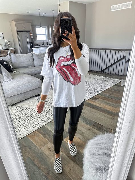 Leggings Band Tee Outfit, Winter Oversized Tshirt Outfit, Cozy Concert Outfit, Leather Leggings Graphic Tee Outfit, Edgy Airport Outfit, Modest Graphic Tee Outfit, Comfy Legging Outfits Spring, Casual Spring Transition Outfits, Oversized Tshirt Legging Outfit