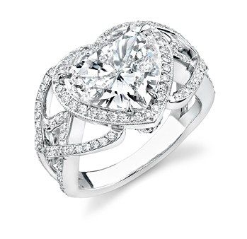 Engagement Rings: 35 of the Shiniest, Blingiest and Most Glam Diamond Rings We've Seen in Years | Glamour Heart Shaped Diamond Engagement Ring, Heart Shaped Wedding Rings, Shaped Engagement Rings, Heart Shaped Diamond Ring, Heart Shaped Engagement Rings, Heart Engagement, Heart Rings, Ring Pillows, Heart Engagement Rings