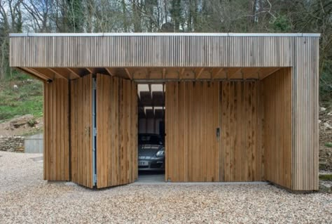 Upstairs, Downstairs: A Workshop and Garage Hidden in a Hillside - Gardenista Feilden Fowles, Garage Workshop Plans, Car Shed, Modern Garage Doors, Garage Workshop Organization, Garage Studio, Carport Garage, Carport Designs, Garage Door Design