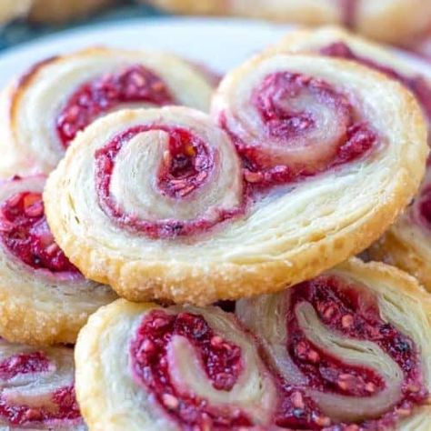 Raspberry Palmiers Delicious, easy and fun these Raspberry Palmiers are made with puff pasty, fresh raspberries and sugar and baked up until golden. Prep Time 35 mins Cook Time 12 mins Total Time 47 mins Course: DessertCuisine: French Servings: 24 cookies Calories: 86kcal Author: Tornadough Alli Ingredients 1 sheet puff pastry defrosted 1/4 - 1/2 cup sugar for work surface and top of dough 6 oz raspberries 1 Tbs sugar 1 tsp cornstarch Instructions Sprinkle half of you sugar on a clean work ... Raspberry Palmiers, Fun Easy Cookies, Palmiers Recipe, Palmier Cookies, Pastries Recipes Dessert, Cake Mug, Raspberry Recipes, Fresh Raspberries, Cream Puff