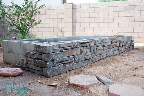 Learn how to build a raised garden bed with concrete cinder blocks and stone veneer. Raised Herb Garden, Garden Bed Layout, Stone Planter, Cinder Block Garden, Raised Flower Beds, Cinder Blocks, Vegetable Garden Raised Beds, Building A Raised Garden, Diy Raised Garden