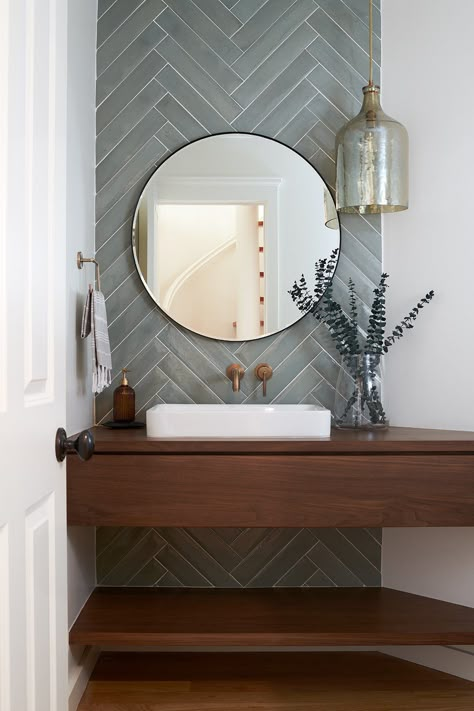 Wood Floor Powder Bathroom, Accent Tile Wall Powder Room, Guest Bathroom Tile Ideas Floor, Powder Bath Accent Wall, Half Bathroom Decor Ideas Small Modern, Modern Bathroom Tiles Design Ideas Feature Wall, Powder Bathroom Tile Wall, Tile Behind Vanity And Toilet, Tile Wall In Powder Room