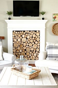 DIY faux fireplace with tv mounted over the fireplace - www.goldenboysandme.com Winter Mantle Decor, Faux Fireplace Mantels, Diy Outdoor Fireplace, Fake Fireplace, Faux Fireplace Diy, Wooden Fireplace, Art Deco Living Room, Small Fireplace, Concrete Fireplace