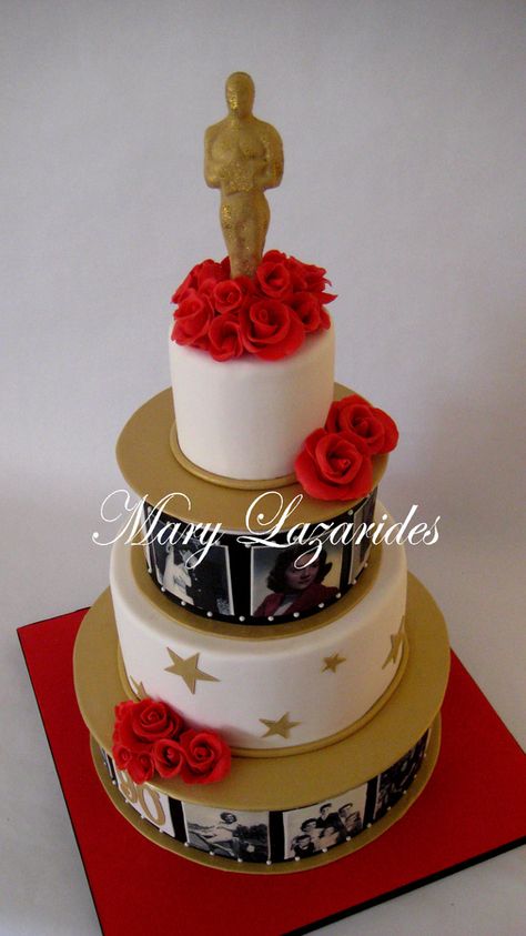 This cake was a birthday cake for a 90 year old woman who loved movies and was an extra in movies and acted in commercials.  I decided to show her "life in pictures" on the cake.  The roses are chocolate.  The oscar is edible as well Red Carpet Theme Cake, Hollywood Cake Ideas, Hollywood Birthday Cake, Hollywood Theme Cake, Red Carpet Cake, Hollywood Theme Party Decorations, Theatre Cake, Hollywood Cake, Old Hollywood Party