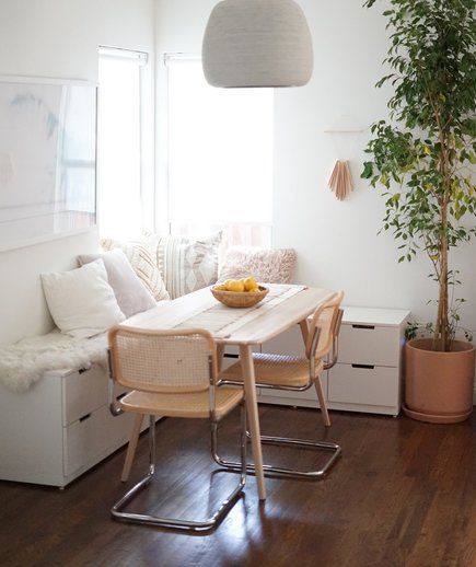 5 IKEA Hacks for Organizing Small Spaces | Small space and small budget? Then, IKEA's probably your best home decor and organizing friend! All of the IKEA hacks here are designed to fit seamlessly into small spaces, plus they sneak in a little extra storage all over the house, like this seating with hidden storage. Your home will instantly feel more organized.  #homedecor #smallspacedecor #organization #realsimple Nordli Ikea, Organizing Small Spaces, Ikea Hack Storage, Ikea Nordli, Small Room Organization, Apartment Dining, Small Space Organization, Dining Nook, Dining Room Bench