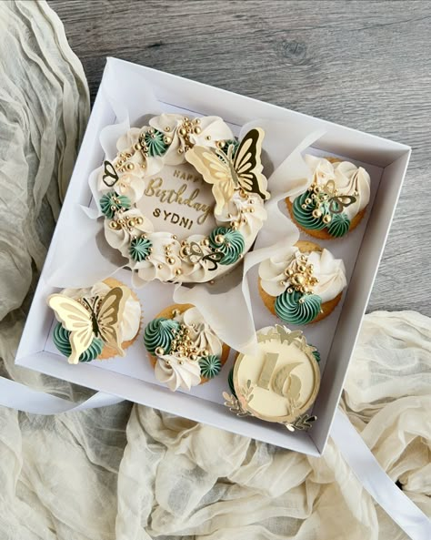 S Y D N I 🤍✨ The prettiest neutrals and green for Sydni’s 16th Birthday 💚 • Latte, Taupe & Eucalyptus @colour.mill • Sprinkles @cakenbakeonline • Embosser @lissieloulondon • Packaging @bakeboxesuk DM or EMAIL to order 🤍 #butterfly #butterflies #bento #bentocake #bentocakes #bentocakeandcupcakes #bentocakesandcupcakes #bentocakeideas #bentodesign #bentocakebox #cakedesign #cupcakes #cupcakedecorating #cakedecorating #bentodecorating #fondantembosser #sprinkles #floraldecor #cakeidea... Cake Business Plan, Cake Mix Desserts, Butterfly Birthday Cakes, Bento Cakes, Butterfly Cupcakes, Cupcake Decorating Tips, Cupcake Gift, Gourmet Cakes, 16 Cake