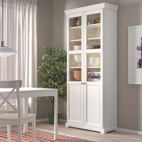 LIATORP Bookcase with glass doors, white, 373/4x841/4" (96x214 cm) - IKEA CA Ikea Liatorp, Bookcase With Glass Doors, Glass Cabinet Doors, Painted Paneling, Uneven Floor, Front Room, Display Cabinet, Panel Doors, Glass Panels