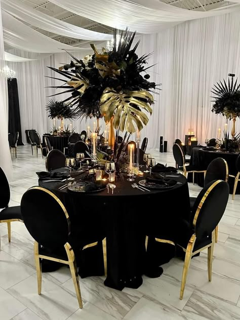 Black And Gold Banquet Ideas, Black Wedding Reception Ideas, Black And Gold Party Centerpieces For Men, Maskarade Black Party, Black Gold Silver Color Palette, A Night Of Elegance Party Ideas, Great Gatsby Table Decorations, Black And Gold Feather Centerpieces, Black Silver And Gold 70th Birthday Party Ideas