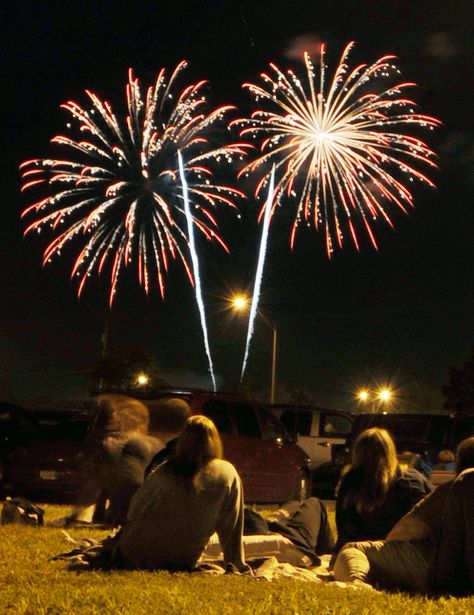 A group of people sits together to watch the city of Ames’ fireworks display from the Iowa State Center parking lot on Thursday night in Ames. Photo by Nirmalendu Majumdar/Ames Tribune People Watching Fireworks, Firework Display, Printmaking Inspiration, Watching Fireworks, Summer Vision, A Group Of People, Friends Group, Pure Happiness, People Dancing