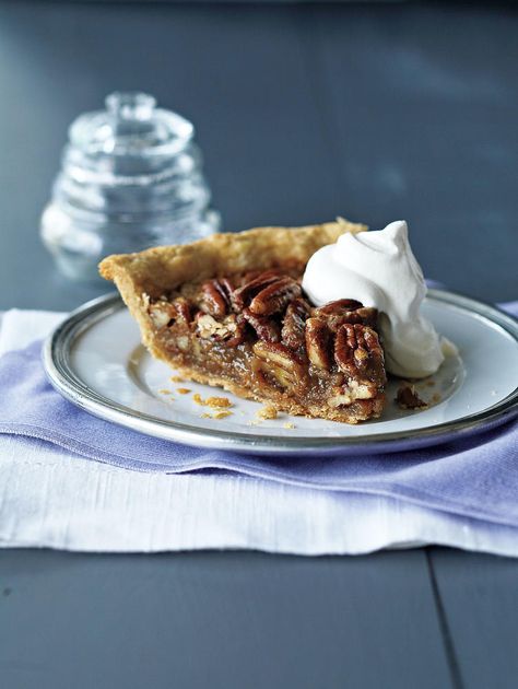 Honey Pecan Pie—This classic fall dessert uses honey in place of highly processed corn syrup. Preheat the baking sheet along with the oven. This will help the pastry cook to a perfect golden brown on the bottom. Serve at room temperature to allow the filling to set. Pecan Pie With Honey, Honey Pecan Pie Recipe, Pecans Desserts, Honey Pecan Pie, Coconut Pecan Pie, Ginger Caramel, Butter Tart Squares, Classic Fall Desserts, Tender Coconut