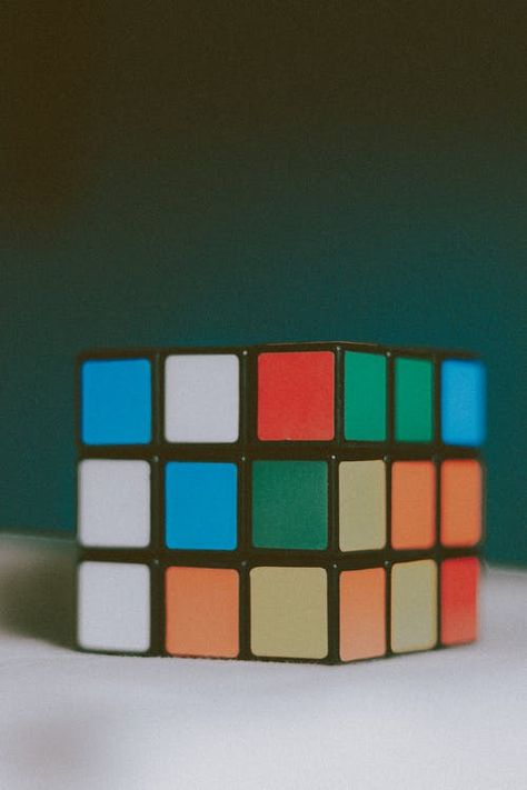 Colorful puzzle cube placed on white surface · Free Stock Photo Cube Games, Rubix Cube, Best Educational Toys, The Wedding Singer, Speed Reading, Cube Puzzle, Rainbow Aesthetic, Some Games, Office Items