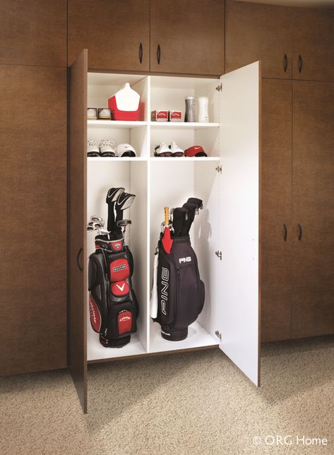 Garage cabinetry with double doors hung on a wall for golf club storage in Westerville Ohio | Innovate Home Org Columbus Ohio Baseball Gear Storage, Work Boot Storage, Golf Club Storage, Wall Organization System, Westerville Ohio, Garage Storage Inspiration, Man Garage, Golf Diy, Old Bookcase