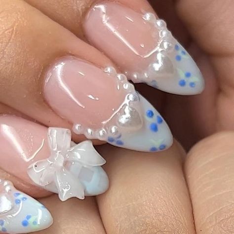 erika ₊˚⊹♡ on Instagram: "milky blueberry nails ⋆.ೃ࿔*:･  ib: @nailsby.tiff   repost!! too cute not too 🤭🤗  #blue #bluenails #cutenails #nails #nailsnailsnails #nailsofinstagram #nailsart #blueberrynails #cute #coquette #coquettenails #coquetteaesthetic #bownails #nailsart #naildesign #trending #explore #explorepage #exploremore #nailstagram #nailinspo #nailinspiration #vancouverbc #richmondbc #nailsoftheday #nails2inspire #nails4today" Blue Nails Charms, Blue Charm Nails, Blueberry Nail Art, Cinderella Blue Nails, Blue Coquette Nails, Cinderella Inspired Nails, Birthday Cake Nails, Cute Blue Nails, Blueberry Nails