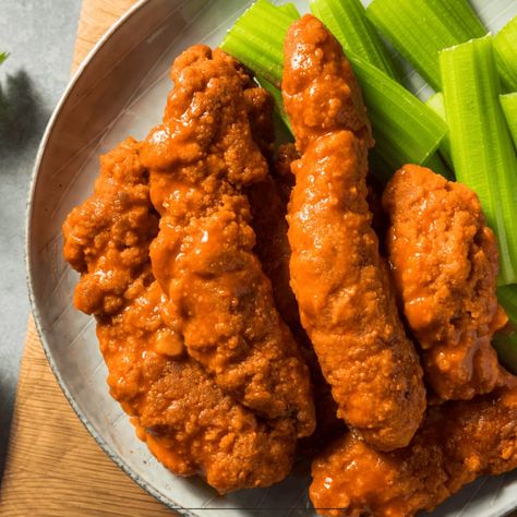 Buffalo Chicken Tenders | Spicy Chicken Strips - TwoSleevers Chicken Tenders Buffalo, Spicy Chicken Strips, Air Fryer Buffalo Chicken Tenders, Buffalo Salad, Tofu Fish, Buffalo Chicken Strips, Spicy Chicken Tenders, Air Fryer Buffalo Chicken, Buffalo Chicken Tenders