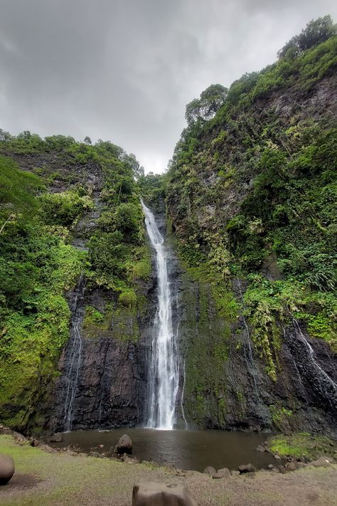 300 feet high waterfall with fresh water pool and a ive going town to beautiful black sand beach with crushing surf waves Tahiti Waterfalls, Tahiti