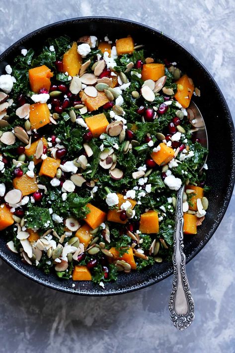 Healthy butternut squash and kale salad with pomegranate, goat cheese and almonds! A great salad during the holiday season. Easy to make and SO delicious! #butternutsquash #kalesalad #healthysalad #healthylunch Pomegranate Goat Cheese, Squash And Kale Salad, Butternut Squash And Kale, Salad With Pomegranate, Healthy Butternut Squash, Mediterranean Quinoa, Quinoa Salad Recipe, Winter Salad Recipes, Kale Salad Recipes