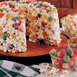 Grandma made this for my birthday every year!  Try it with candy corn and peanuts for Halloween :) Christmas Popcorn Cake, Popcorn Cake Recipe, Popcorn Cake, Gluten Free Marshmallows, Popcorn Treats, Candy Popcorn, Candy Cake, Candy Cakes, Popcorn Recipes