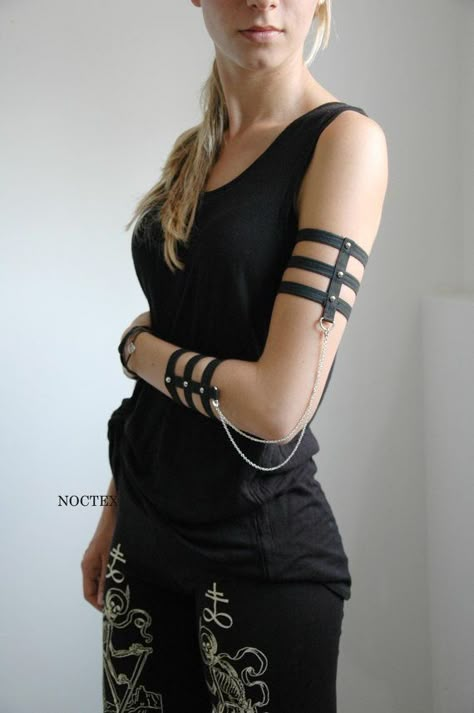 Skeleton Arm, Harness Fashion, Arm Cuffs, Arm Jewelry, Grande Cosmetics, The Skeleton, Leather Harness, Delicate Chain, Garters