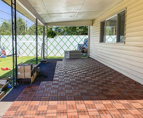 Here's how we installed IKEA Runnen tiles on our back porch.  Get all the scoop, as well as other DIY projects we've tacked in this space! Ikea Runnen Ideas, Ikea Runnen Decking, Runnen Ikea Ideas, Diy Outdoor Flooring, Ikea Deck Tiles, Ikea Runnen, Ikea Tiles, Porch Refresh, Decorative String Lights