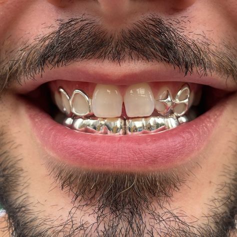 London and NYC book through my website! We’re international now :) Creative freedom custom shape, windows and 2x4 teeth on bottom in silver #grillz #grillznyc #londongrillz #silver #star Silver Bottom Grillz, Silver Grillz Men, Grillz Teeth Men, Bottom Grillz, Teeth Gems, Silver Teeth, Silver Grillz, Grillz Teeth, Tooth Gems