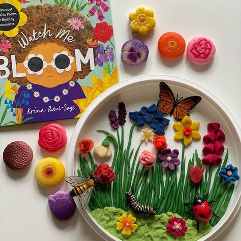 Yellow Door on Instagram: "How stunning are those playdough flowers by the very talented @playingwithprimrose paired beautifully with our Flower Sensory Play Stones in this bookish play 🌿🌸 Posted @withregram • @playingwithprimrose •WATCH ME BLOOM• I was SO inspired by the beautiful illustrations that I couldn’t resist creating this floral scene out of playdough for Primrose to explore. She said the bugs were having ‘a yummy snack’ from the flowers and made ‘green string pudding’ out of the st Play Doh Flowers, Flower Sensory, Spring Sensory, Daisy Theme, Sand Game, Yellow Door, Montessori Learning, Yellow Doors, Water Play