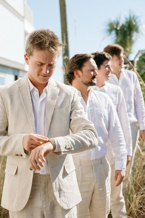 groomsmen-lined-up-looking-away-groom-fixing-watch-grayton-beach-30a-wedding-photographers Groomsmen Hawaii Wedding, Mexico Groomsmen Attire, Groom Linen Beach Wedding, Bridal Party Beach Wedding, Beach Wedding Bridal Party Attire, Beach Wedding Groomsmen Attire, Beach Groomsmen Attire, Beach Wedding Party Attire, Beach Wedding Outfits For Men