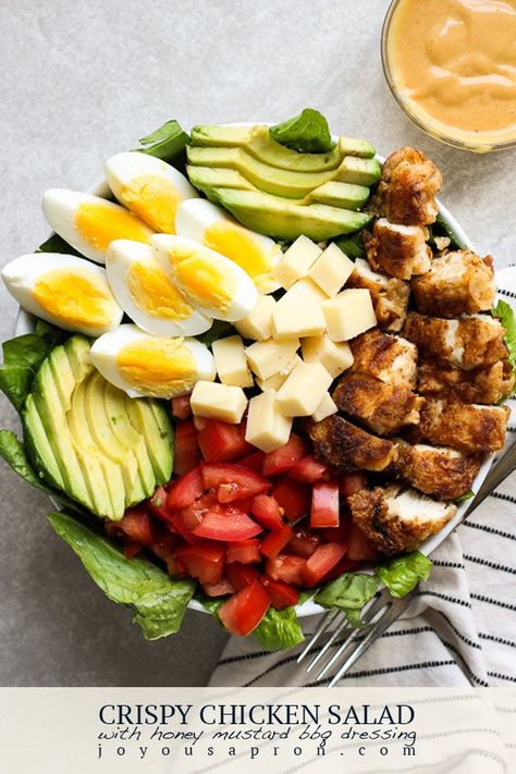 Crispy Chicken Salad - a yummy and easy dinner salad recipe! Lettuce, tomatoes, avocados, boiled eggs, cheese and a crispy pan fried breaded chicken, topped with Honey Mustard BBQ Dressing. The perfect meal for the Spring and Summer #salad #dressing #lettuce #chicken #healthy #Spring #dinner #meal #recipe #joyousapron Yummy Salad Recipes With Chicken, Meal With Vegetables, Main Course Salads Recipes, Vegetables Salad Recipes, Dinner Salads Recipes Main Courses, Main Course Salads, Bbq Dressing, Main Course Salad, Crispy Chicken Salad