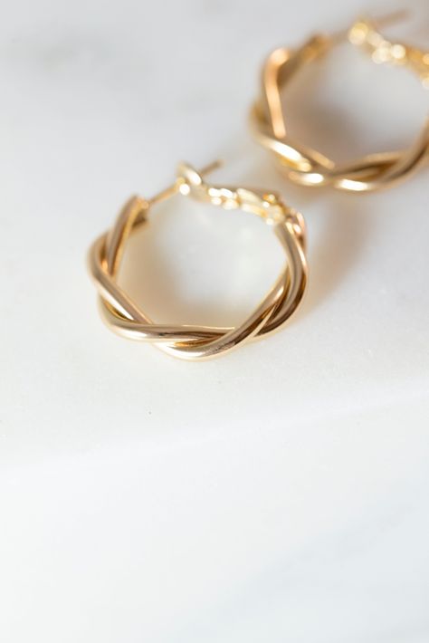 [PaidLink] Our Dainty Twisted Hoop Earrings Are A Perfect, Minimalist Earrings To Add To Any Outfit! Made With 14K Gold Filled Metal, And Measure 27Mm X 28Mm. Available In Gold. Lead And Nickle Free. #goldminimalistjewelry Twisted Gold Hoop Earrings, Pretty Jewellery Earrings, Gold Hoop Earrings Aesthetic, Girly Jewellery, Trendy Gold Earrings, Little Hoop Earrings, Minimal Hoop Earrings, Twisted Earrings, Layer Jewelry