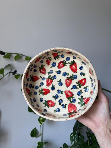 This Hand Painted Deep Salad Plate is a beautifully crafted piece of ceramic art, perfect for serving salads or as a versatile vegetable bowl. Each plate is meticulously hand-painted with a vibrant tomato design, adding a touch of nature's bounty to your table setting. Made from durable stoneware, this plate is not only visually appealing but also practical, being food-safe and suitable for everyday use. It makes a thoughtful and unique ceramic gift for loved ones or a charming addition to your own kitchenware collection. Ideal for those who appreciate handcrafted items with a personal touch. 19.5 cm diameter / 1200 ml 7.67inches diameter / 40.58 fl oz It's an absolutely unique ceramic deep plate because all my creations are made without a pottery wheel or any forms. So please note before Plates With Fruit Design, Plates Pottery Painting, Cool Bowls Ceramics, Pasta Pottery Painting, Pottery Designs Bowl, Paint Your Own Bowl Ideas, Fruit Plate Pottery, Pottery Painting Salad Bowl, Fruit Ceramic Painting