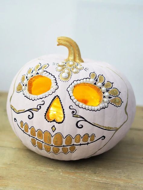 Sugar Skull Pumpkin, Sugar Skull Painting, Pumpkin Painting Ideas, Pumpkin Display, Pumpkin Carving Ideas, Pumpkin Designs, Halloween Pumpkin Designs, Halloween Pumpkins Painted, Painted Pumpkin