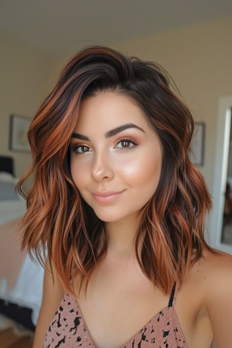 Looking for a fresh update to your hairstyle that is both trendy and adaptable? Consider trying out copper balayage for a contemporary, bold look. This hair coloring technique offers a versatile style that exudes warmth, depth, and added dimension to your locks. Stun with the captivating transformation this vibrant shade can bring to your overall appearance. Upgrade your hair game with copper balayage today! Shadow Root Fall Hair, Copper Balayage On Short Hair, Dark Brown Copper Hair Color Balayage, Root Melt Brunette To Red, Copper Balayage With Blonde Highlights, Copper Hair Color With Dark Roots, Dark To Copper Balayage, Copper Blonde Balayage Dark Roots, Red Biolage Hair