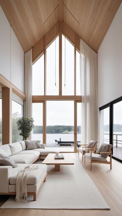 Stunning Scandinavian Living Room with Lakeside Views White Oak Vaulted Ceiling, Living Room Skylight Ideas, Scandinavian House Design Interiors, Vaulted Ceiling Curtains, Natural Light Interior Design, Barndo Windows, Scandinavian Sunroom, Scandinavian Living Room Nordic Style, Natural Wood Home Decor