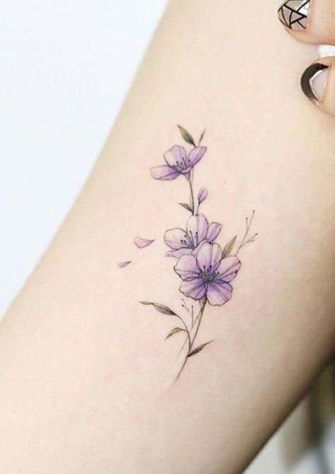 Minimal Violet Tattoo, Delicate Black Tattoo, Delicate Violet Flower Tattoo, Purple Violet Flower Tattoo, Violet Wrap Around Tattoo, Tattoo Ideas Violet Flower, Violet Flower With Butterfly Tattoo, Wild Lily Tattoo, Purple Pansies Tattoo