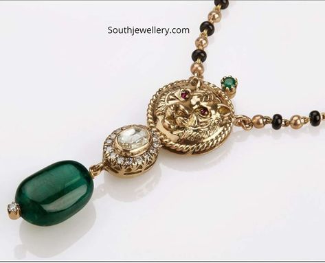 Royal Bengal Mangalsutra by Sabyasachi Heritage jewelry, Sabyasachi mangalsutra design with tiger pendant, trendy mangalsutra necklace Thaali Design, Maharashtrian Jewellery, Mangal Sutra, Emerald Jewellery, Dream Diary, Mangalsutra Design, Pooja Mandir, Tiger Pendant, Black Beads Mangalsutra Design