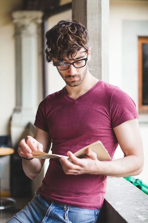 Young College Student Reading a Book at University by Giorgio Magini for Stocksy United Reading Book Pose Drawing Reference, Reading A Book Pose Drawing, Male Pose Reference, Drawing Body Poses, People Poses, Body Reference Poses, Human Poses Reference, Figure Poses, Poses References