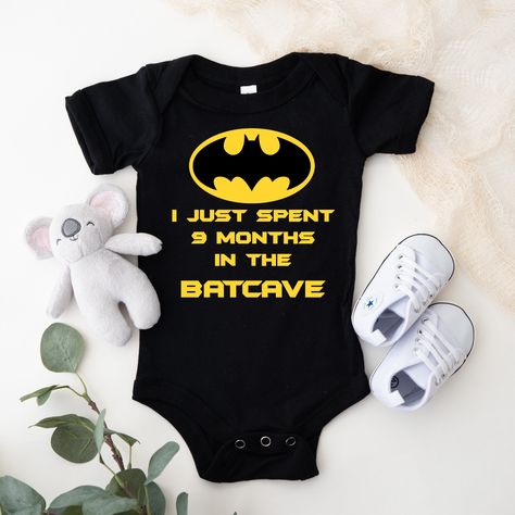 This adorable graphic Onesie® for the “Batman” enthusiast, this is a very popular item for babies. This is one of my "Best Sellers" and is a great baby shower or new baby gift. These can be customized in your choice of vinyl color as shown. Garments come only in Black, Gray & White. Onesies® come in a variety of sizes of your choice. We use high quality, soft flex vinyl which not only creates a sharp, vivid graphic but will never look "faded" or “washed out” like some inks commonly do. Processin Custom Onesies Boy, Batman Nails, Baby Boy Batman, Batman Baby Shower, Batman Baby, The Batcave, Superhero Baby Shower, Graphic Onesies, Baby Batman