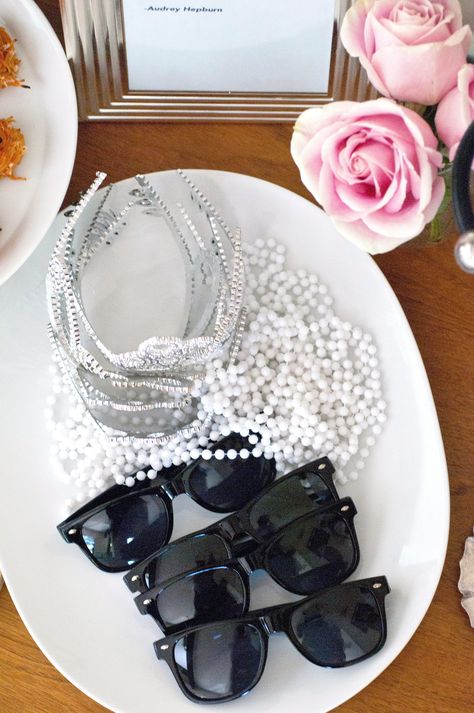 Guests need to look the part, so offer them Audrey Hepburn's classic look from Breakfast at Tiffany's of black sunglasses, lengths of pearls, and shimmering tiaras. Breakfast At Tiffanys Party Ideas, Tiffany Birthday Party, Party Breakfast, Tiffany Birthday, Tiffany Theme, Tiffany Bridal Shower, Paris Birthday Parties, Tiffany's Bridal, Tiffany Party