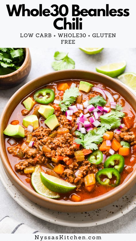 Simple and delicious Whole30 beanless chili is perfect for a cozy night in! Made with nourishing protein, a rainbow of healthy vegetables, and plenty of spices for deep and rich flavor. Easy to make and perfect for the whole family! Whole30, paleo, and gluten free. Beanless Chili Recipe, Whole 30 Soup, Beanless Chili, Healthy Slow Cooker Recipes, Whole30 Recipes, Healthy Slow Cooker, Slow Cooker Recipes Healthy, Healthy Vegetables, Cozy Night