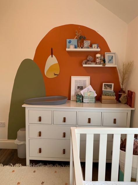 Burnt Orange Playroom, Orange Gender Neutral Nursery, Green And Orange Nursery Gender Neutral, Nursery Orange Accents, Green Painted Walls Bedroom, Burnt Orange Nursery Gender Neutral, Gender Neutral Nursery Terracotta, Orange Playroom, Orange Nursery Boy