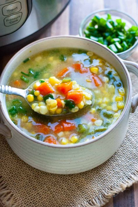 This Indian sweet corn soup recipe is quick and easy to make in the instant pot, full of veggies like beans, carrots, and of course sweet corn. A vegetarian, vegan and gluten-free soup that's so light and fresh, you'll be reaching out for second and third helpings! Corn Soup Vegetarian, Sweet Corn Soup Recipe, Veg Recipes Of India, Corn Soup Recipes, Recipes In Marathi, Soup Vegetarian, Sweet Corn Soup, Egg Drop Soup, Indian Corn